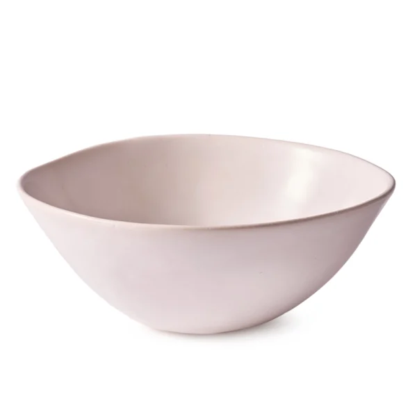 Perfect Hideaways: A medium-sized matte white ceramic bowl with an unglazed, handcrafted feel and softly sloped rim. Perfect Hideaways shop