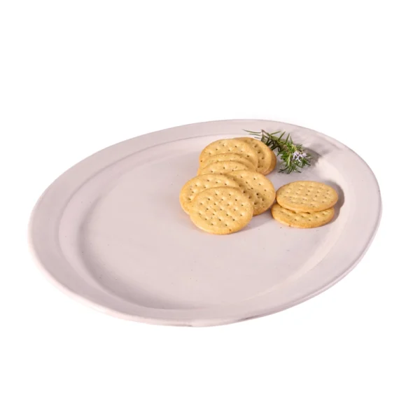 Perfect Hideaways: Country Oval ceramic platter in soft off-white glaze, styled with round crackers and a sprig of fresh rosemary for a rustic serving presentation. Perfect Hideaways shop