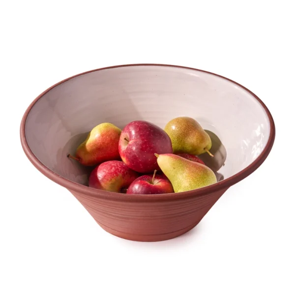 Perfect Hideaways: A deep terracotta and ivory glazed Country Lebrillo bowl filled with fresh red apples and green pears, blending rustic charm with natural beauty. Perfect Hideaways shop
