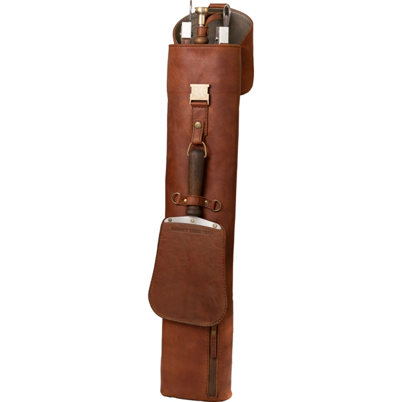 Perfect Hideaways: Full Jack Sack. A beautifully handcrafted brown leather tool carrier with visible metal tools, a wooden-handled accessory, and detailed stitching, designed for durability and style in outdoor settings. Perfect Hideaways shop