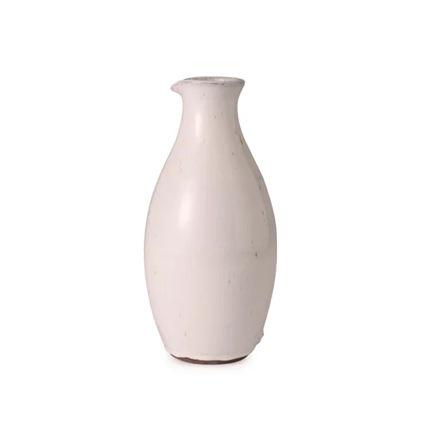 Perfect Hideaways: A handmade, rounded ceramic Classic Round Jug in a soft off-white glaze, featuring a narrow neck and subtly speckled finish. The shop