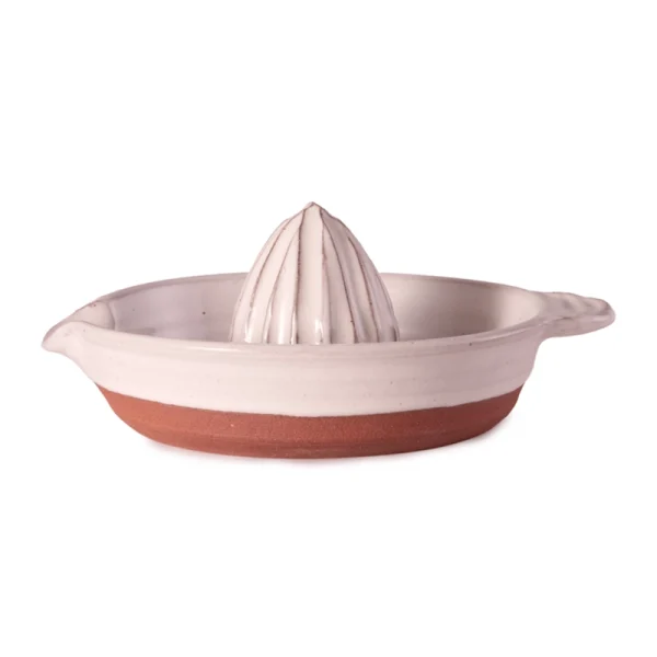 Perfect Hideaways: Side view of a handmade ceramic country citrus squeezer in white glaze with exposed terracotta base, highlighting its elegant, artisanal design. Perfect Hideaways shop
