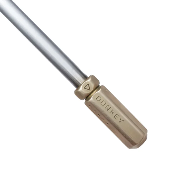 Perfect Hideaways: Donkey Fire Blower. Detailed view of the brass nozzle stamped with the word "DONKEY", attached to a sturdy metal shaft, combining function with rustic charm. Perfect Hideaways shop