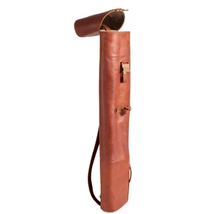 Perfect Hideaways: The Jack Sack. Side profile of a vintage-inspired leather yoga mat bag showing its curved flap opening, shoulder strap, and structured form. Perfect Hideaways shop
