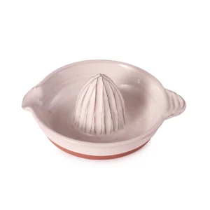 Perfect Hideaways: Overhead angle of a ceramic country citrus squeezer featuring a ribbed dome and dual pouring spouts, crafted in a rustic white and terracotta finish. Perfect Hideaways shop