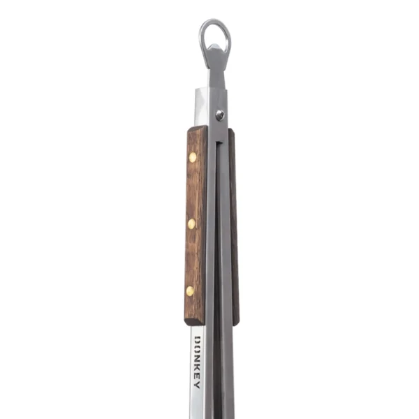 Perfect Hideaways: Detail of the wooden handle and brass rivets on the Donkey long tongs, combining functionality with rustic charm. Perfect Hideaways shop