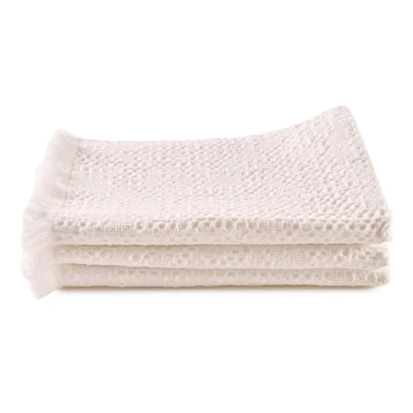 Perfect Hideaways: A stack of three white waffle-textured bathmats with fringed ends, neatly folded and displayed against a white background. Perfect Hideaways shop