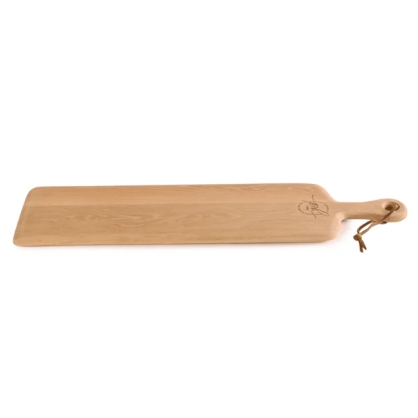 Perfect Hideaways: A single elongated oak narrow paddle board with a smooth finish and handle loop, perfect for serving bread, cheese, or antipasti. Perfect Hideaways shop