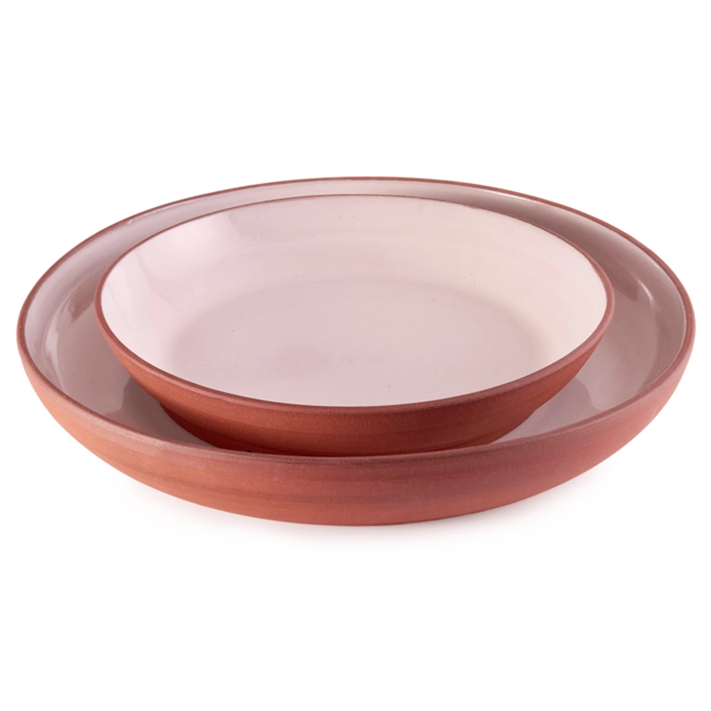 Perfect Hideaways: A set of two handcrafted terracotta and blush-toned Wide Country Lebrillo dishes, one nested inside the other, with a smooth glazed interior and matte outer finish, Perfect Hideaways shop