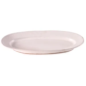 Perfect Hideaways: Overhead view of an oval-shaped Classic Fish Platter with a smooth white glaze and organic finish. Perfect Hideaways shop