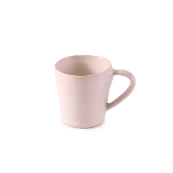 Perfect Hideaways: A single ceramic flare mug in a soft matte cream finish with an elegantly shaped handle and flared lip. The shop