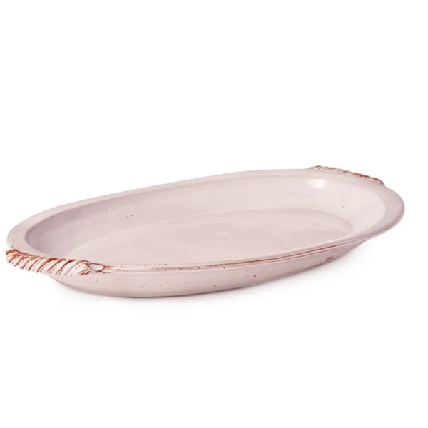 Perfect Hideaways: A large oval classic baking dish with rustic rope-detailed handles and a smooth glazed finish. The shop