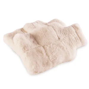 Perfect Hideaways: A pair of fluffy sheepskin hot water bottle covers displayed on a white background, highlighting their warm, natural wool texture and snug design. Perfect Hideaways shop