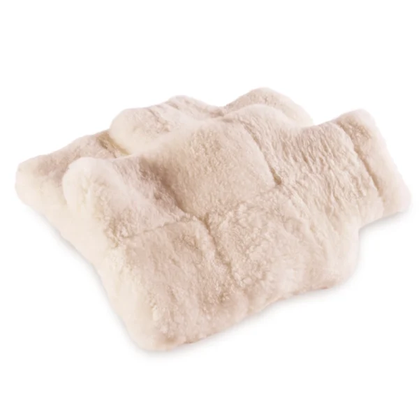 Perfect Hideaways: A pair of fluffy sheepskin hot water bottle covers displayed on a white background, highlighting their warm, natural wool texture and snug design. Perfect Hideaways shop