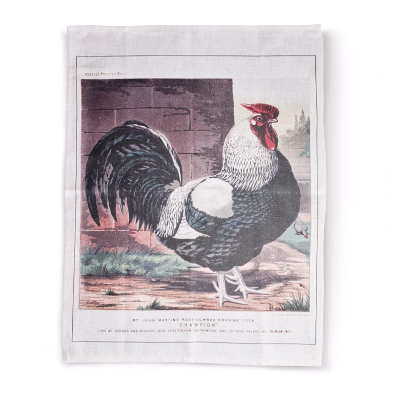 Perfect Hideaways tea towel featuring a vintage illustration of a proud rooster titled “Champion,” printed on a white linen background with rustic tones. Perfect hideaways shop.